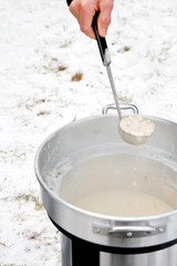 Hot soup outdoors in Winter