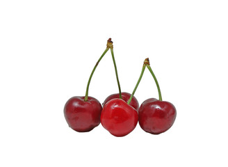 Fototapeta na wymiar Four fresh cherries with waterdrops against white background.
