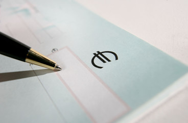 Carnet de Chèque et stylo..