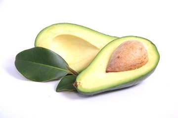 Avocado pear halves on white background