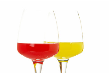Two glasses with beverages, isolated on white background