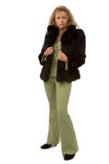 portrait of young woman in fur coat