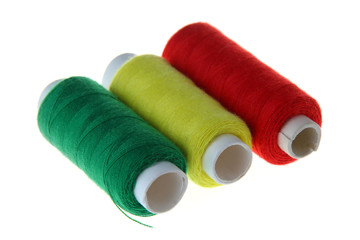 Coils with threads of three colors: red, yellow, green.