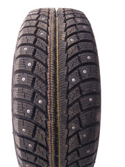 Winter tyre with thorns on white background