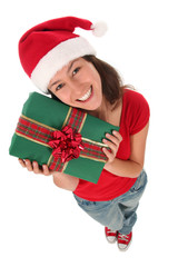 Woman in Santa hat holding gift box