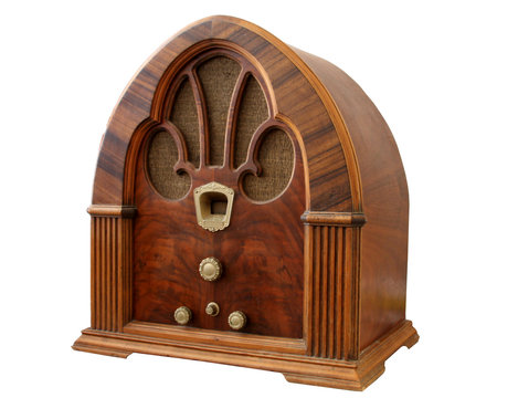 Old Wooden radio at slight angle with white background.