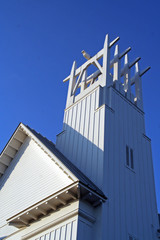 Fototapeta na wymiar church steeple at seaside