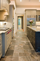  upulent kitchen with slate floors and granite counters