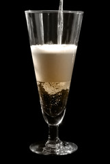 Pouring Beer Into Glass