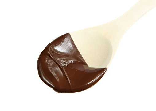 Wooden Spoon Covered In Melted Dark Chocolate