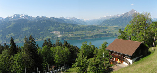 Fototapeta na wymiar Swiss Alps Landscape, Lake - Mountains - Cottages
