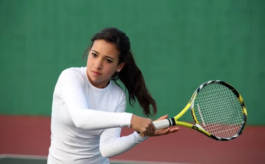 Poster Teenage girl playing tennis © Galina Barskaya