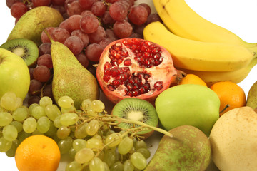 Different fruits on a white background.