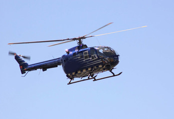 a helicopter in the sky- motion blur on rotors