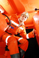Miner working in a mine shaft stock photo