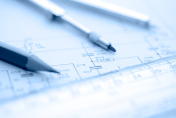 Business accessories on a background of diagrams..