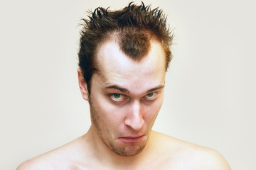 Obraz premium Portrait of crazy man on the white background.