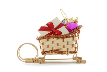 Santa's sledge with gift box and christmas ornaments