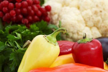 An image of cabbage amongst various vegetables