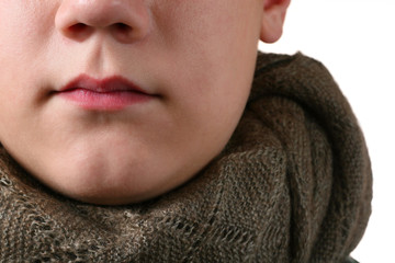The sick throat which has been rolled up by a woolen scarf