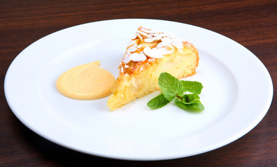 tasty pie with apple and with grated almond
