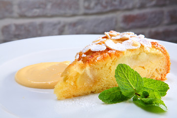 tasty pie with apple and with grated almond