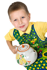 portret of little boy with big teapot © AGphotographer