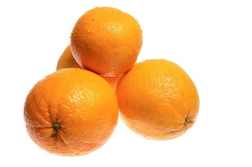 four oranges isolated on white
