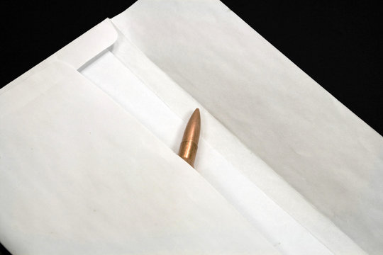 A bullet in an envelope inside