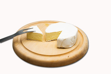 Cheese on wood plate