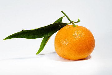 orange ripe mandarin on white background