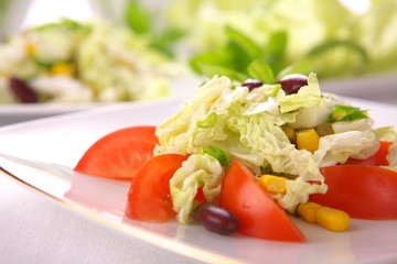 Fresh tomato salad with corn and basil
