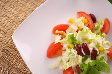 Fresh tomato salad with corn and basil