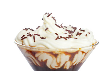 Capuccino reflected on white background. Shallow DOF