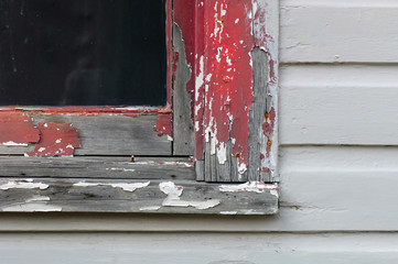Image of a vintage window with cracked old paint