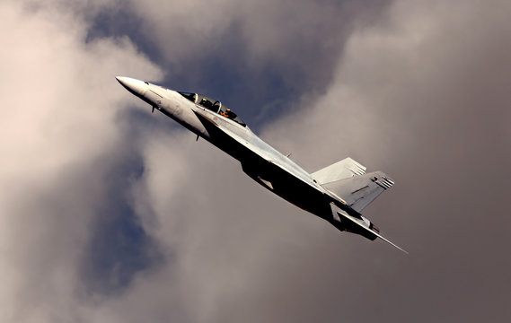Nice Image of a F-18 passing through the clouds