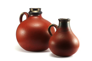 two old jugs isolated on the white background