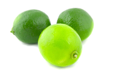 Fresh lime fruits isolated on white