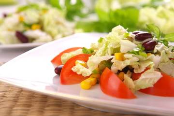 Fresh tomato salad with corn and basil