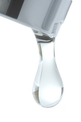 Tap with a drop of water