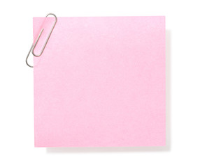 Blank pink notepaper, with paperclip.  On white.