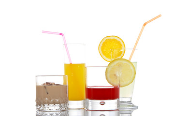 A set of glasses with beverages, reflected on white background