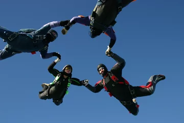  Skydivers form a formation © Joggie Botma
