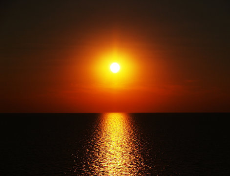 red sunset in the dark sea