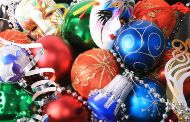 Colorful christmas bulbs, mask, beads and streamer
