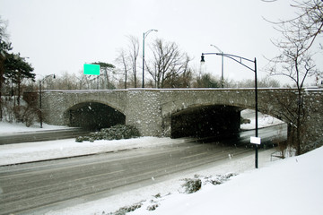 Stone highway bridge in winter
