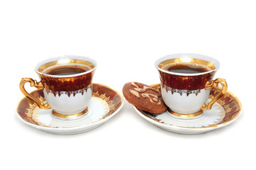 Coffee cups with a cake