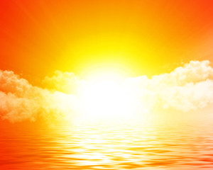 Sun rising over the ocean