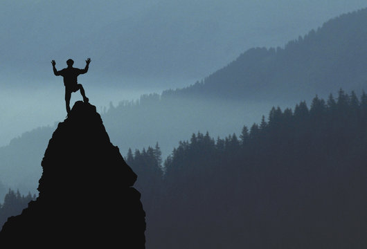 Bersteiger auf dem Berggipfel