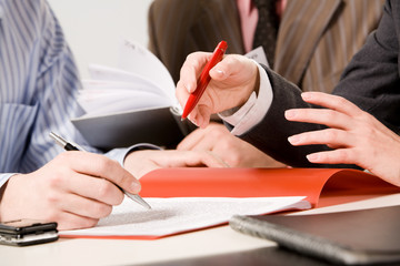 Typical image of people’s hands at business meeting